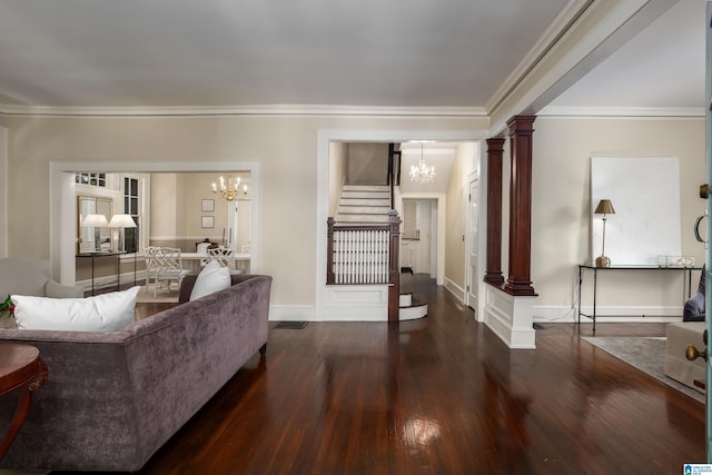 1479 Milner Cres S, Birmingham, AL 35205 - living area with a chandelier, ornate columns, stairway, dark wood-type flooring, and crown molding