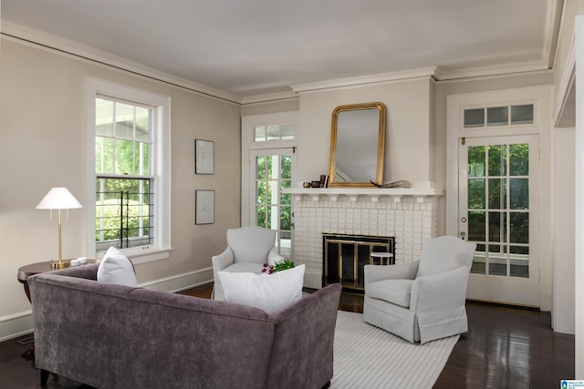 1479 Milner Cres S, Birmingham, AL 35205 - living room with crown molding, a brick fireplace, wood finished floors, and baseboards