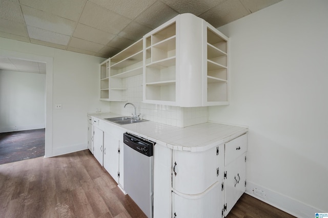 kitchen featuring a sink, open shelves, dishwasher, dark wood-style flooring, and tasteful backsplash