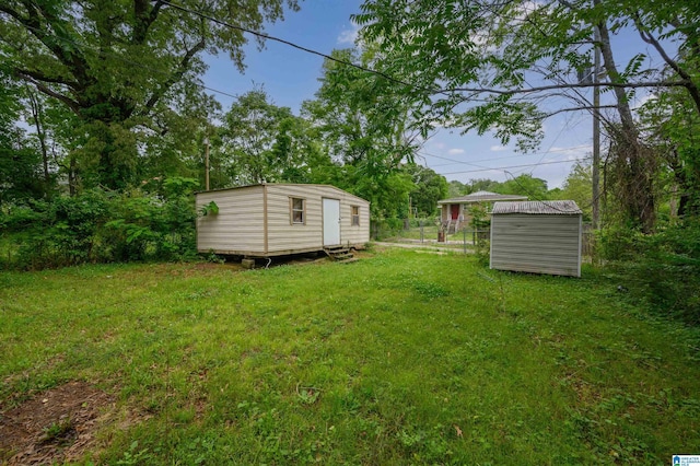 view of yard with a storage unit and an outdoor structure