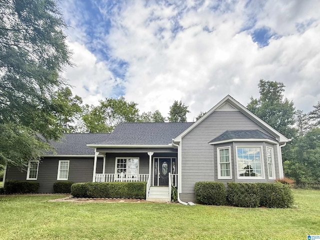 105 Mountain View Ln, Springville, AL 35146 - view of front facade featuring a porch, a front yard, and roof with shingles
