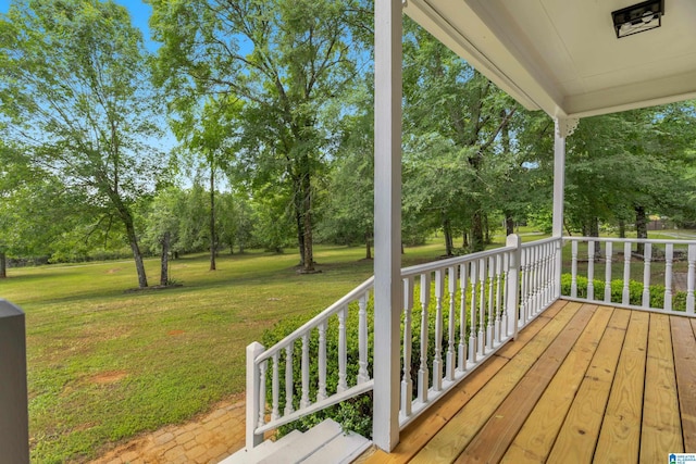 105 Mountain View Ln, Springville, AL 35146 - wooden porch with view of scattered trees and a lawn