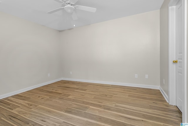 105 Mountain View Ln, Springville, AL 35146 - spare room featuring light wood-type flooring, ceiling fan, and baseboards