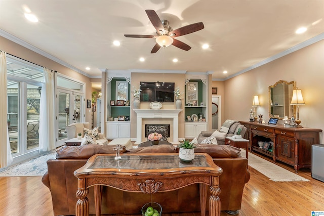 135 Weatherly Way, Pelham, AL 35124 - living area with wood finished floors, ceiling fan, a fireplace, crown molding, and recessed lighting
