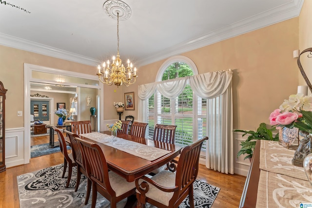 135 Weatherly Way, Pelham, AL 35124 - dining room with ornamental molding, wainscoting, light wood finished floors, and a chandelier
