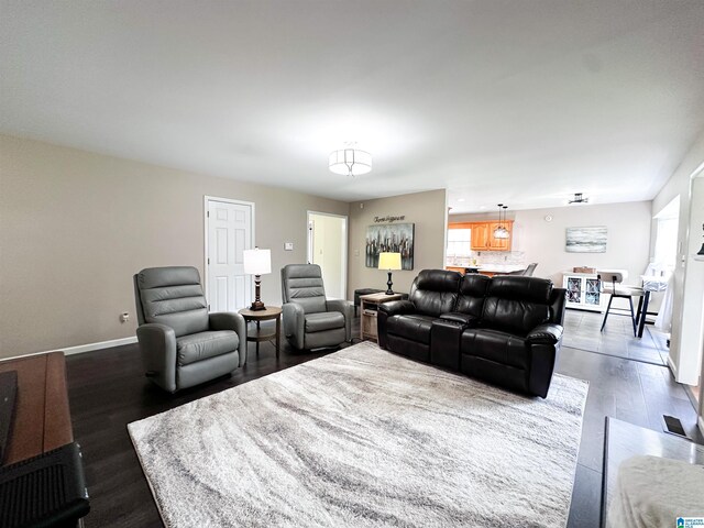 3455 Self Creek Rd, Warrior, AL 35180 - living area featuring wood finished floors, healthy amount of natural light, and baseboards