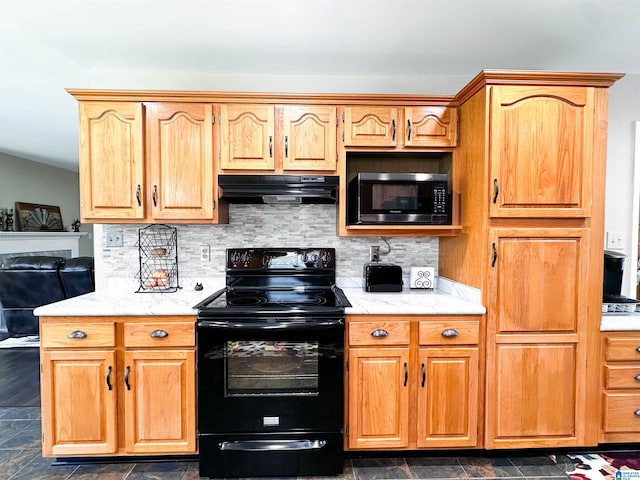 3455 Self Creek Rd, Warrior, AL 35180 - kitchen featuring under cabinet range hood, black appliances, and backsplash