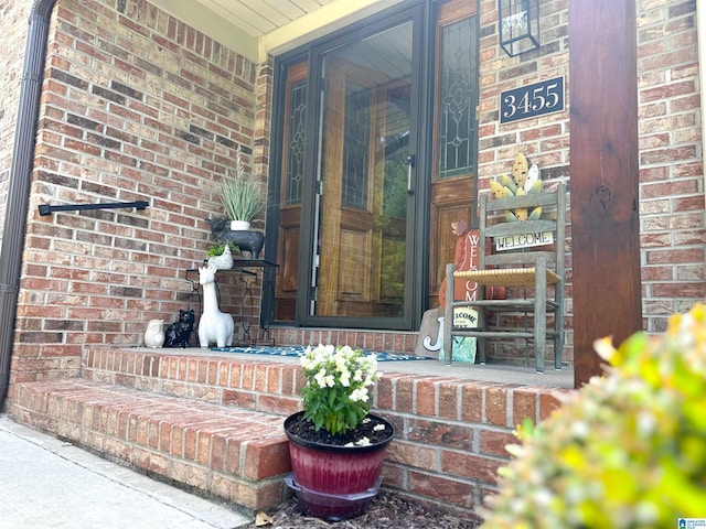 3455 Self Creek Rd, Warrior, AL 35180 - property entrance with a porch and brick siding