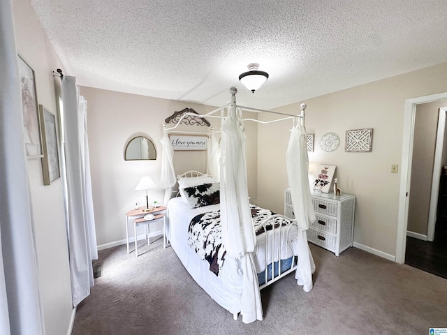 3455 Self Creek Rd, Warrior, AL 35180 - carpeted bedroom featuring a textured ceiling and baseboards