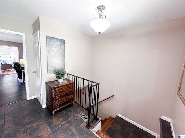 3455 Self Creek Rd, Warrior, AL 35180 - stairway featuring baseboards and stone finish flooring