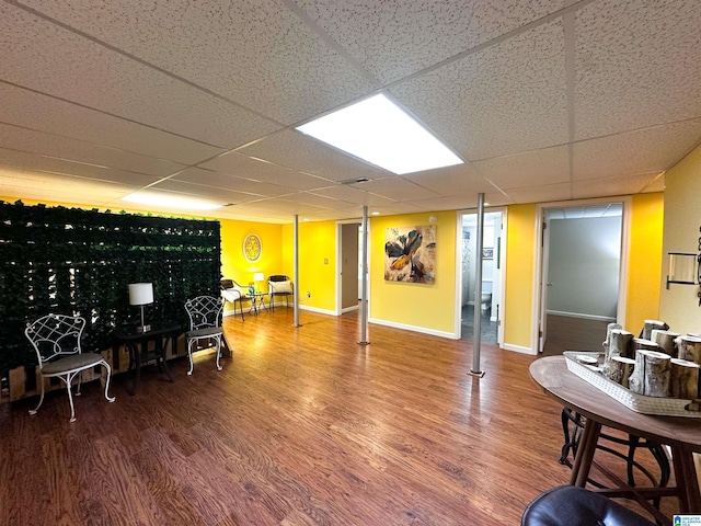 3455 Self Creek Rd, Warrior, AL 35180 - living room with wood finished floors, a drop ceiling, and baseboards
