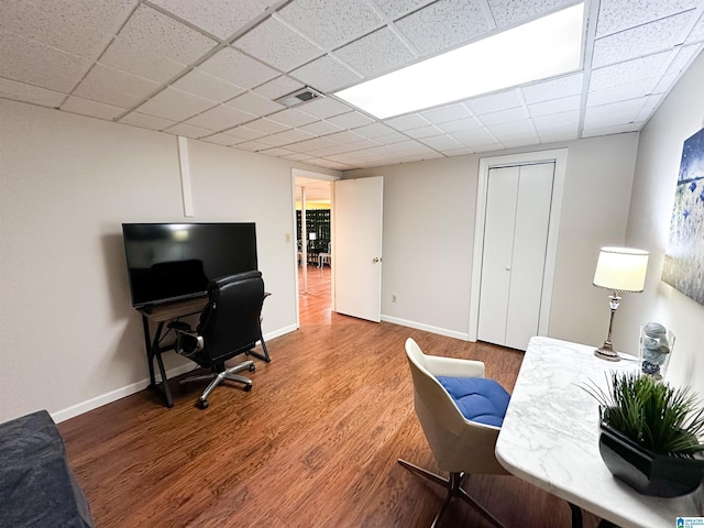 3455 Self Creek Rd, Warrior, AL 35180 - office space featuring wood finished floors, baseboards, and a drop ceiling