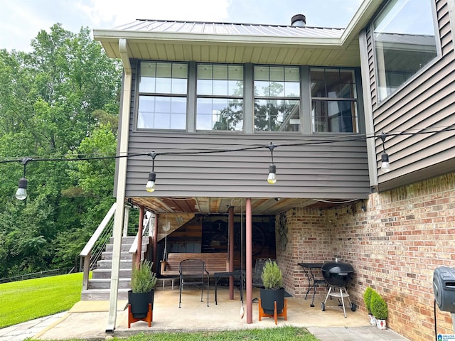 3455 Self Creek Rd, Warrior, AL 35180 - view of patio with stairway and area for grilling