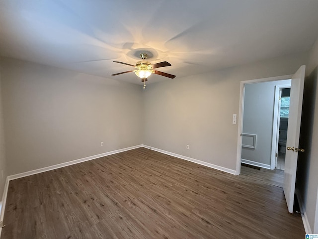 1118 Eagle Dr, Maylene, AL 35114 - spare room with ceiling fan, dark wood-type flooring, and baseboards