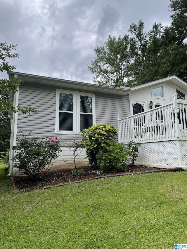 1118 Eagle Dr, Maylene, AL 35114 - view of front of house featuring a front yard and a deck