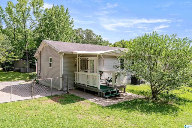 1118 Eagle Dr, Maylene, AL 35114 - view of front of home with a deck, a gate, and roof with shingles