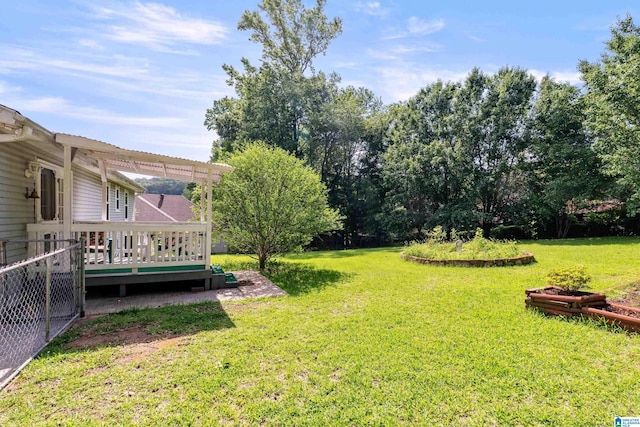1118 Eagle Dr, Maylene, AL 35114 - view of green lawn featuring a deck and a pergola