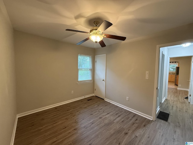 1118 Eagle Dr, Maylene, AL 35114 - unfurnished room featuring wood finished floors, baseboards, and ceiling fan