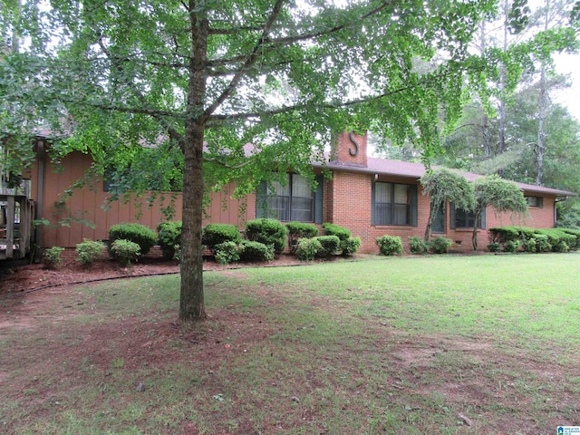 3212 County Road 730, Cullman, AL 35055 - view of front of property featuring a front yard and brick siding