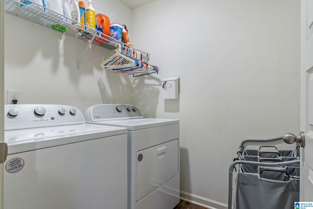 204 Koslin Loop, Calera, AL 35040 - laundry room featuring washer and dryer, dark wood-style floors, and baseboards