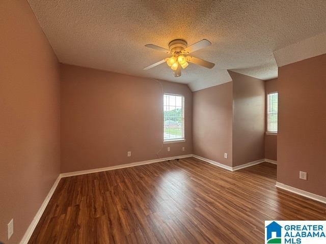 7601 Meadows Dr S, Mobile, AL 36619 - spare room with ceiling fan, wood finished floors, a textured ceiling, and baseboards