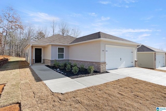 ranch-style home with a garage, driveway, brick siding, and a shingled roof