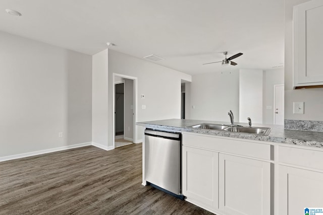 kitchen with a sink, dishwasher, dark wood-type flooring, ceiling fan, and white cabinetry