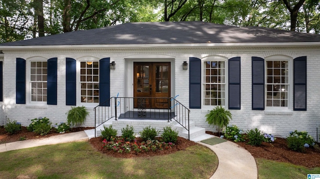 3317 Overton Rd, Mountain Brook, AL 35223 - doorway to property featuring brick siding and roof with shingles