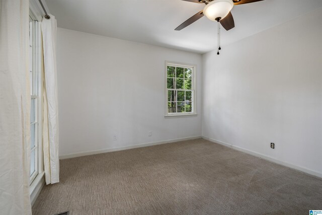 3317 Overton Rd, Mountain Brook, AL 35223 - carpeted empty room featuring a ceiling fan and baseboards