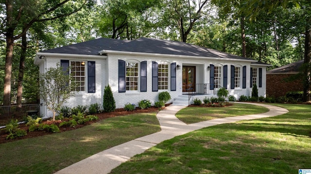 3317 Overton Rd, Mountain Brook, AL 35223 - ranch-style house featuring brick siding and a front lawn