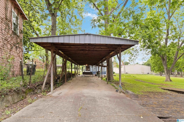 view of car parking with a carport and driveway