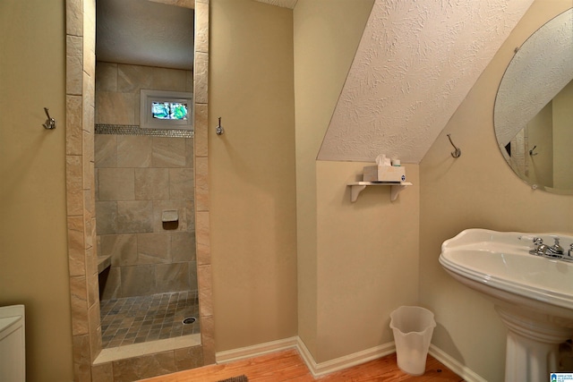 2974 Crescent Crest Dr, Wedowee, AL 36278 - full bathroom with walk in shower, wood finished floors, baseboards, toilet, and a sink