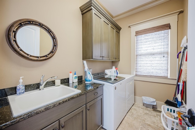 5226 Mountain Ridge Parkway, Birmingham, AL 35222 - washroom with cabinet space, washing machine and dryer, crown molding, light tile patterned flooring, and baseboards