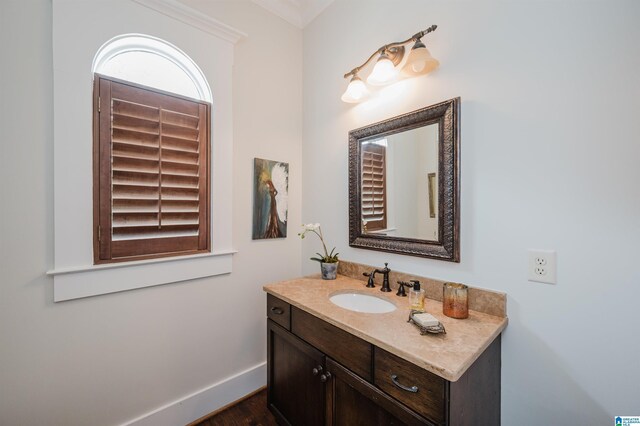 5226 Mountain Ridge Parkway, Birmingham, AL 35222 - bathroom with baseboards, wood finished floors, and vanity