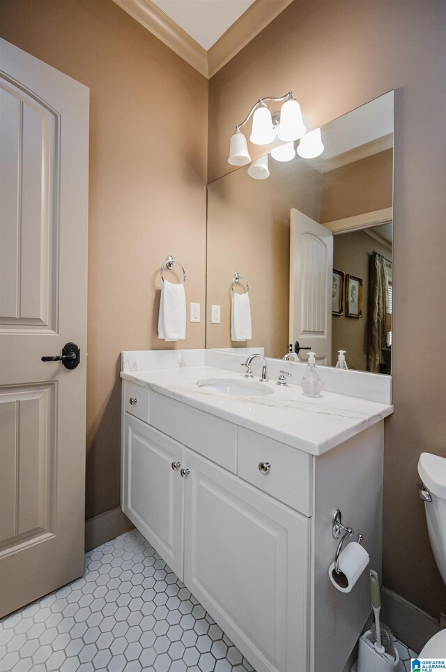 5226 Mountain Ridge Parkway, Birmingham, AL 35222 - bathroom featuring vanity, toilet, and crown molding