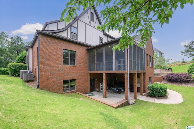 5226 Mountain Ridge Parkway, Birmingham, AL 35222 - back of property featuring brick siding, a yard, and a patio