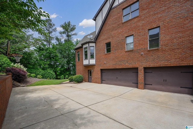 5226 Mountain Ridge Parkway, Birmingham, AL 35222 - view of home's exterior featuring a garage, concrete driveway, and brick siding