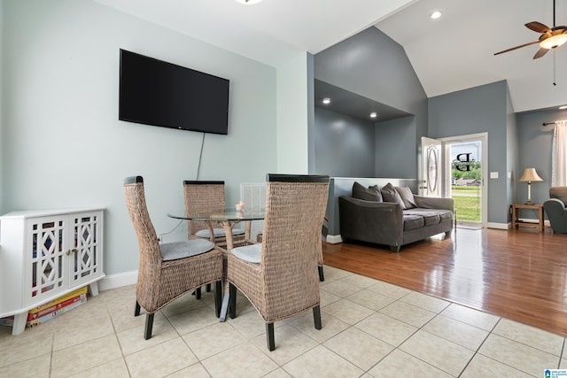 180 Thornberry Dr, Hayden, AL 35079 - dining area featuring light tile patterned flooring, high vaulted ceiling, ceiling fan, and baseboards