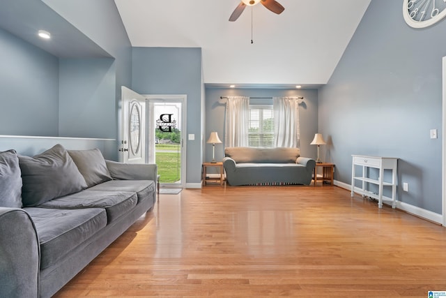 180 Thornberry Dr, Hayden, AL 35079 - living area with a ceiling fan, baseboards, light wood-style floors, and high vaulted ceiling