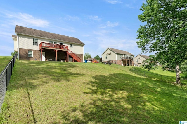180 Thornberry Dr, Hayden, AL 35079 - rear view of house with stairway, a deck, and brick siding