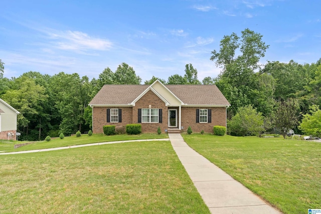 180 Thornberry Dr, Hayden, AL 35079 - ranch-style house with a front yard and brick siding