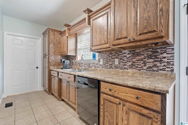 180 Thornberry Dr, Hayden, AL 35079 - kitchen featuring dishwasher, a sink, backsplash, light countertops, and light tile patterned flooring