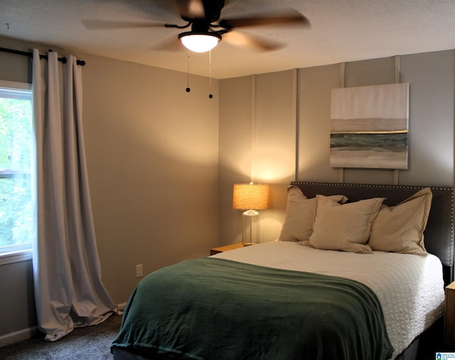 1140 Tribe Trl, Alabaster, AL 35007 - carpeted bedroom with multiple windows and ceiling fan