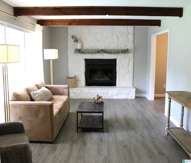 1140 Tribe Trl, Alabaster, AL 35007 - living area featuring wood finished floors, beamed ceiling, a fireplace, and baseboards