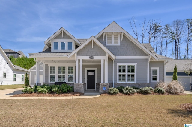 3104 Simms Lndg, Pelham, AL 35124 - craftsman house featuring a front yard, a porch, and stone siding