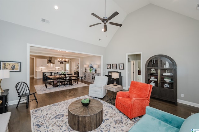 3104 Simms Lndg, Pelham, AL 35124 - living room featuring wood finished floors, ceiling fan, a chandelier, baseboards, and high vaulted ceiling