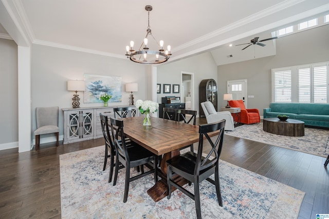 3104 Simms Lndg, Pelham, AL 35124 - dining area featuring dark wood-style flooring, a chandelier, ceiling fan, crown molding, and baseboards