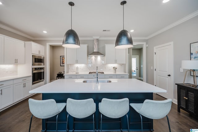 3104 Simms Lndg, Pelham, AL 35124 - kitchen with appliances with stainless steel finishes, wall chimney exhaust hood, decorative backsplash, recessed lighting, and dark wood finished floors