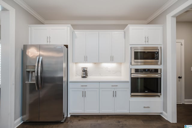 3104 Simms Lndg, Pelham, AL 35124 - kitchen with stainless steel appliances, white cabinets, crown molding, light countertops, and dark wood finished floors