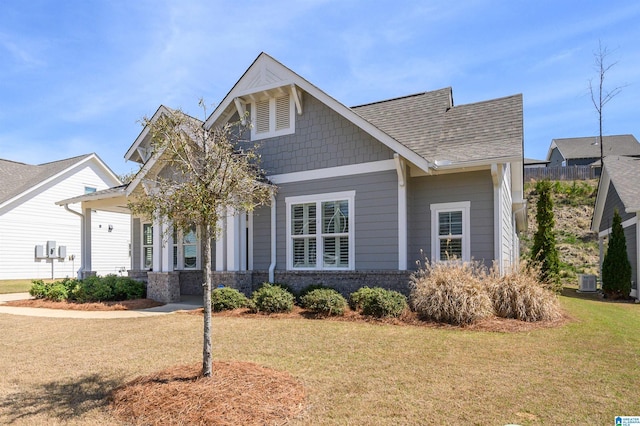 3104 Simms Lndg, Pelham, AL 35124 - craftsman inspired home with a front yard, cooling unit, and roof with shingles